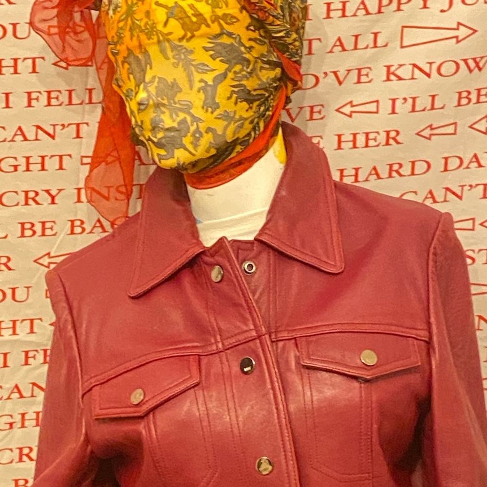 Red Leather Jacket with Classic Design and Prominent Collar